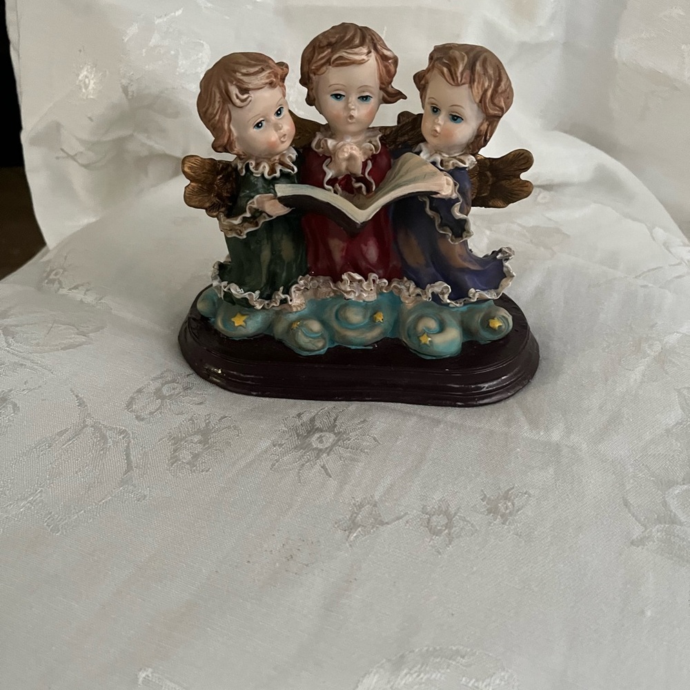 Trio of angels singing figurine